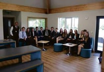 College students quiz MP on economy