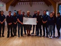 Cheque presented to construction charity