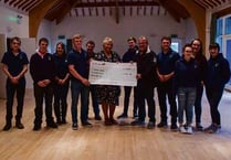Cheque presented to construction charity