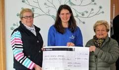 Money raised on whist holiday donated to The Long House
