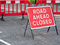 Resurfacing works being carried out following delay caused by poor weather
