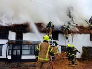 Road remains closed following huge village fire