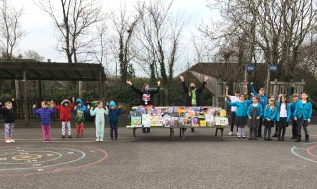 Children work to gift presents