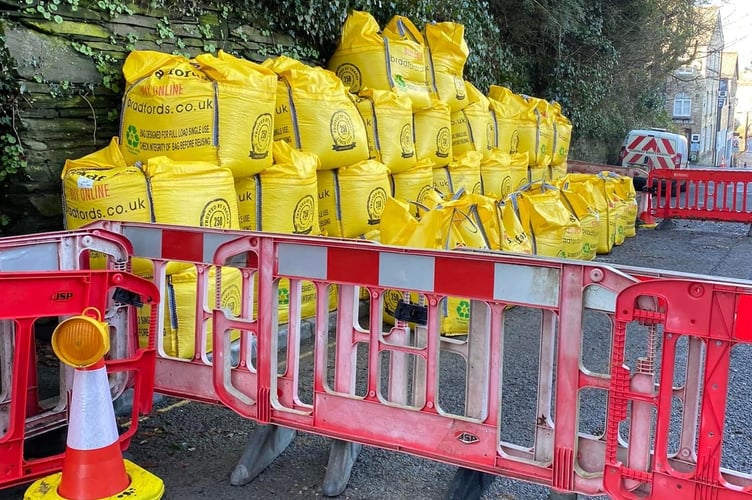 This temporary measure has been implemented to hold up the collapsed wall on Race Hill, Launceston, until the owners are able to come up with a more permanent solution