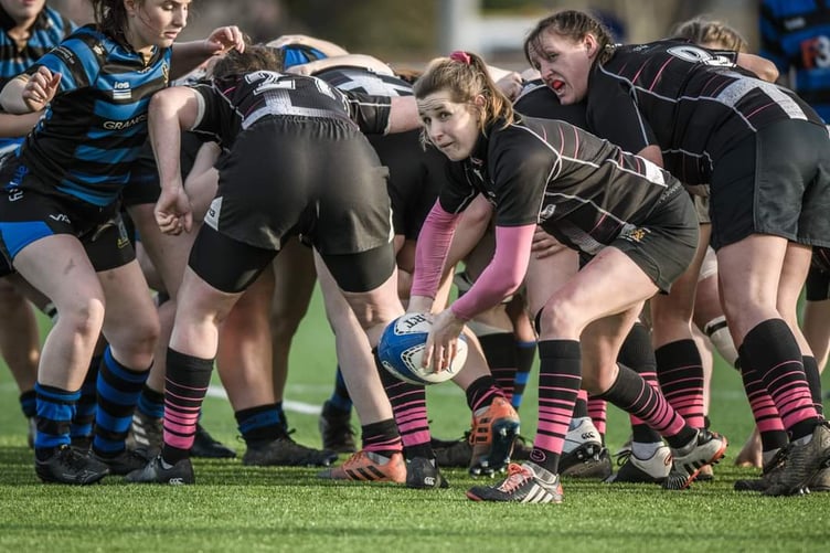 Scrum-half Amy Warman, pictured making a pass, had a good game in defeat. Picture: Rod's Photography