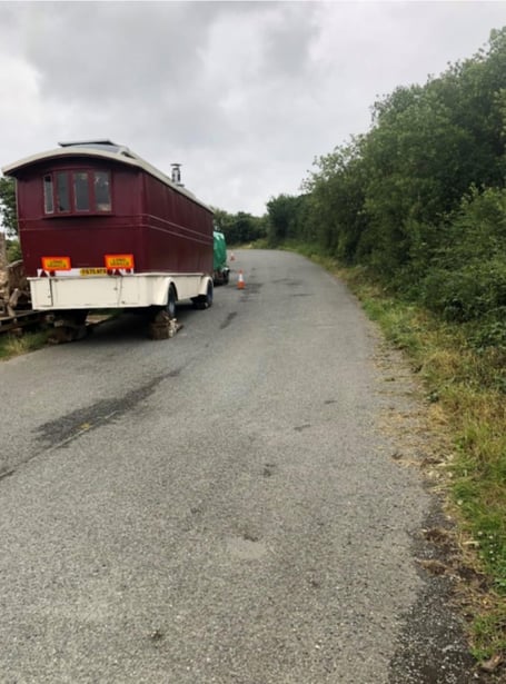 Photographs provided by Des Petersen showing his vehicles and wood carvings in the layby he works from in Launcells