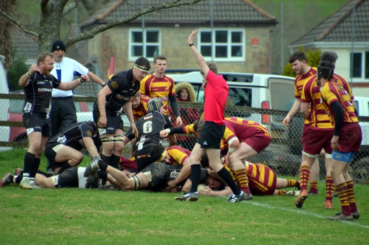 George Bone scores Launceston's late try at Okehampton on Saturday, February 25.