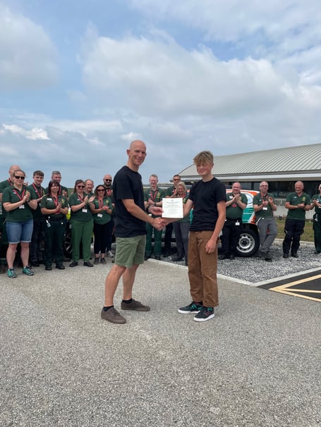 Oscar presenting Mike with a Royal Humane Society Award for his quick-thinking actions which helped save his life