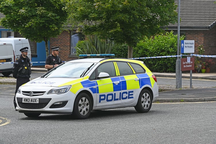 Devon and Cornwall Police officers at an investigation scene at Bodmin Hospital