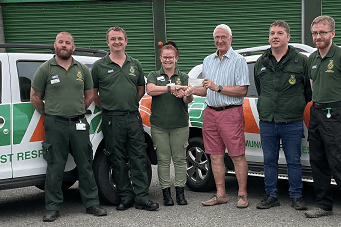 Roger Seward presenting a cheque for £828.34 to Trudi Lindsay from Bude CFR’s and her team of Scott, Charlie, Andy, Jamie and Kevin