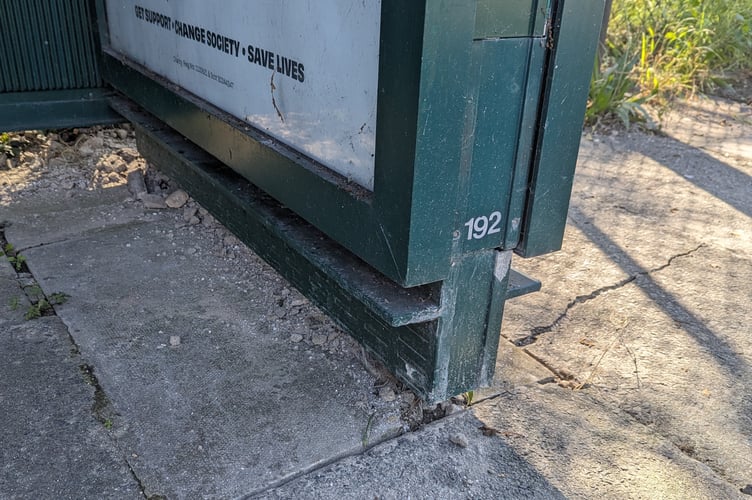 The bus shelter panel.