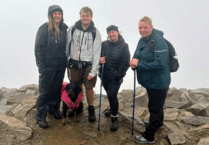 Bude adventurers brave storm to climb Snowdon for charity