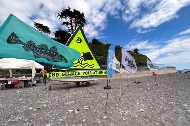 A dirty water protest held on Seaton Beach by Extinction Rebellion and Surfers Against Sewage