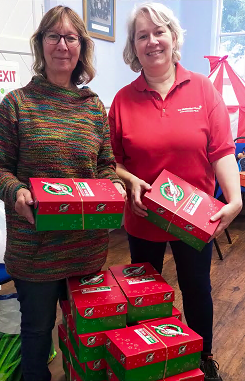 Special “boxing” day: Bude and Holsworthy Methodist Circuit administrator Debbie Whelan, and lay pastoral worker Michelle Hogarth with the packed shoeboxes ready to be sent to needy children