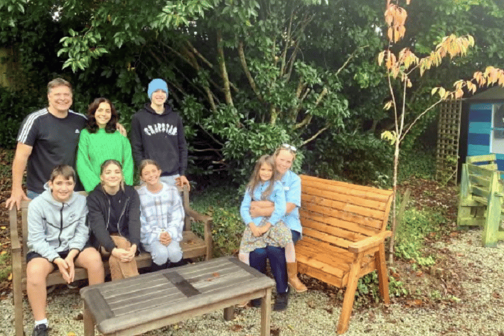 The family of the late Annette Simonsen are pictured with their donation