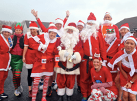 Santa run spreads Christmas cheer through town
