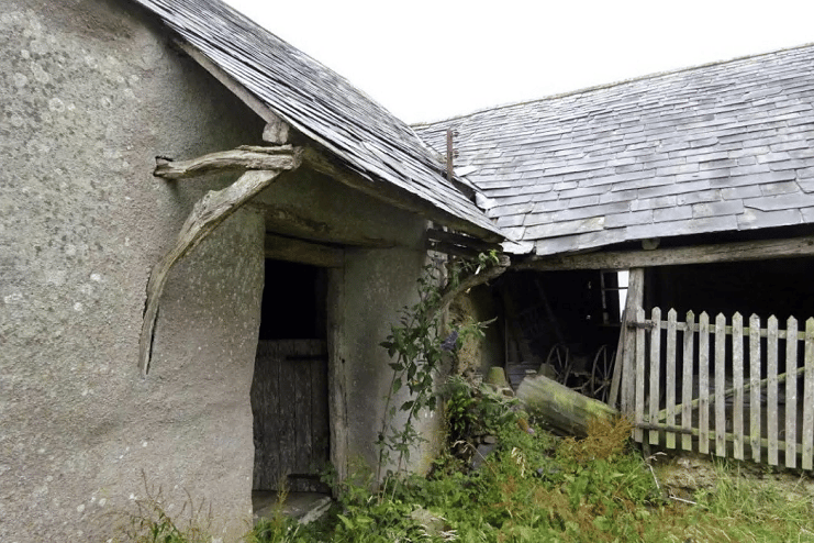 View of west entrance to old threshing barn at the Grade I listed Cullacott Farmhouse near Launceston.