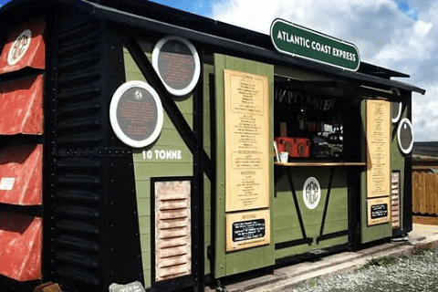 The former train carriage is now an open-air cafe