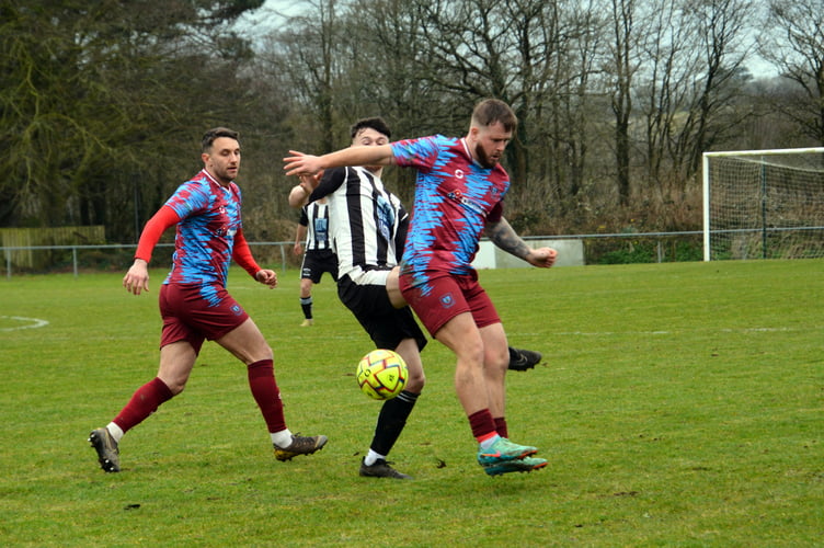 Launceston's Denham Guild (right), pictured at Holsworthy last season, scored a screamer to earn his side a deserved point at Callington on Boxing Day. Picture: Rodney Parrish