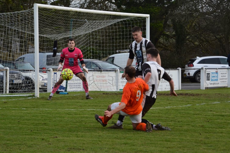Holsworthy goalkeeper Ryan Chadwick, pictured earlier in the season against Camelford, made some decent saves at Penzance.