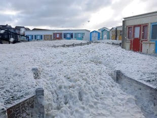 Storms engulf Bude beaches with sea foam