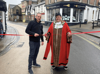 Councillors 'reopen' town after signs depict it as 'closed'