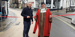 Councillors 'reopen' town after signs depict it as 'closed'