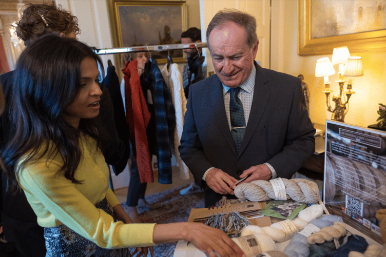 Launceston businessman with Prime Minister's wife at business event