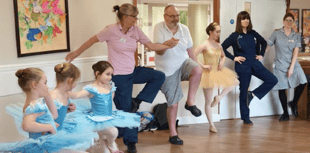 Care home enjoy toe tapping visit and singalong performance