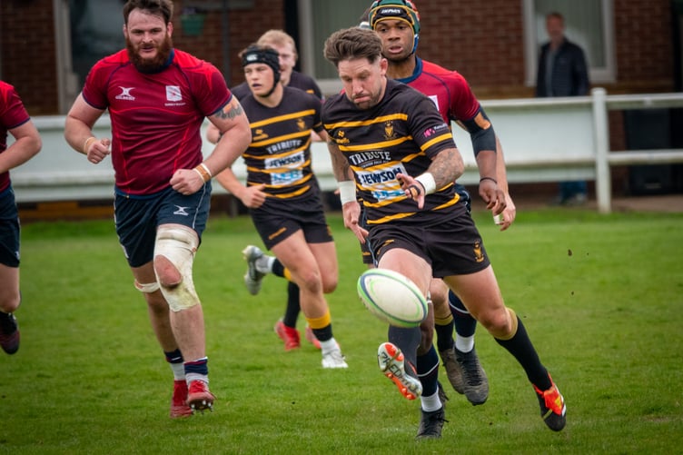 St Austell full-back Matt Shepherd kicks the ball on.