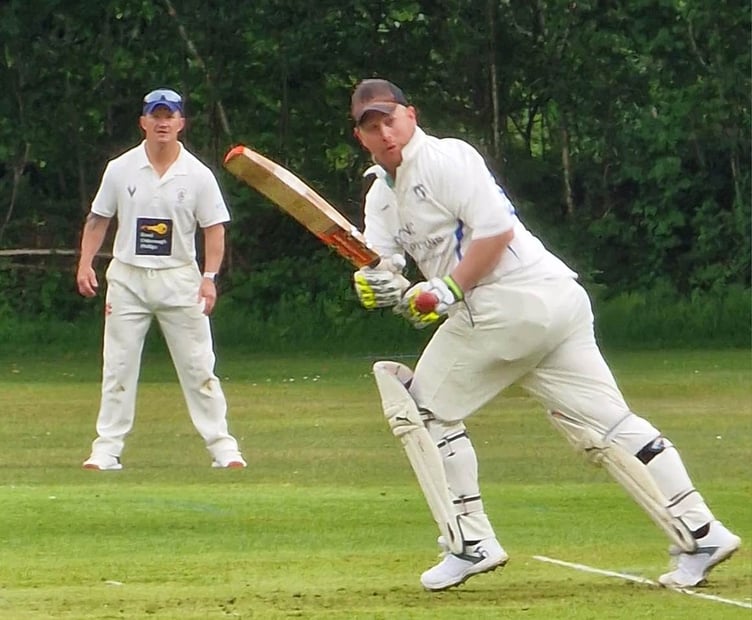 Gunnislake's Russell Holloway clips the ball into the leg-side during his half century.
