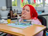 Paralysed woman overcame the odds to paint with her mouth