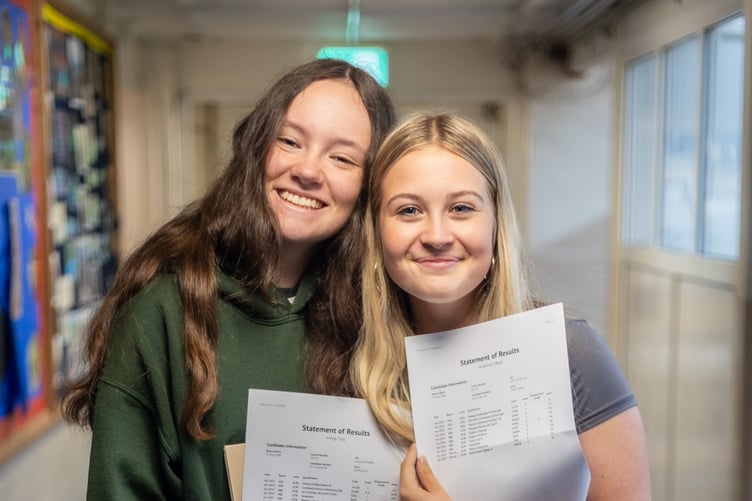 Tilly Irving and Maya Hoddinott are all smiles after receiving their results