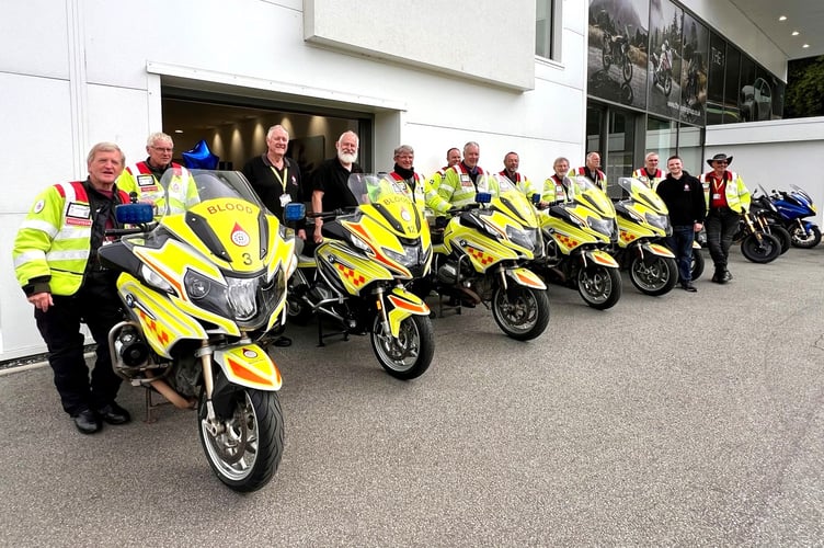 The group welcomes bike number 12 to the fleet