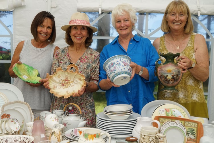Sue, Sue, Wendy and Helen await the rush on the ever popular brick a brack stall. (Picture: Adrian Jasper)