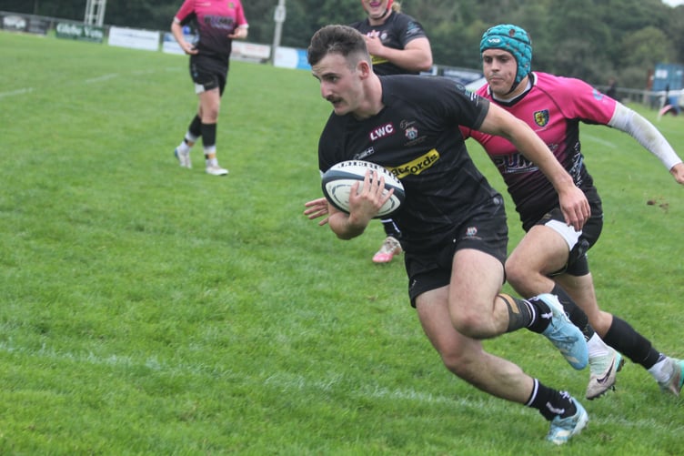 Launceston winger Ollie Bebbington, pictured scoring against Chew Valley earlier in the season, is out injured along with five other regular starters. Picture: Paul Hamlyn