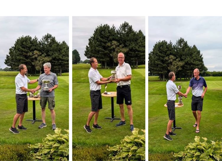 Holsworthy captain Mark Brumham presents trophies to three players. From left: Jeremy Horwood (Jubilee Cup winner), Ian Kirby (club champion and Scratch Cup winner) and Pete Isaacs (Best Net club champion). Pictures: Holsworthy Golf Club