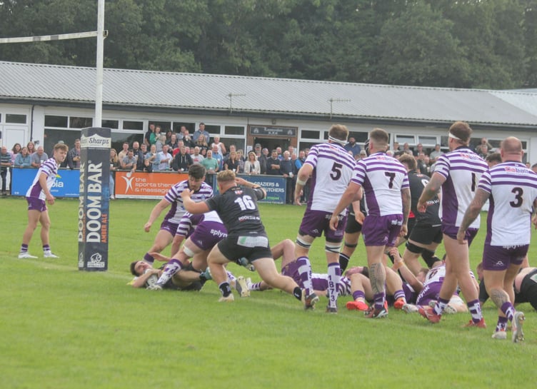 Free-scoring winger Ollie Bebbington, pictured scoring against Exmouth earlier in the season, is back in contention for Saturday. Picture: Paul Hamlyn
