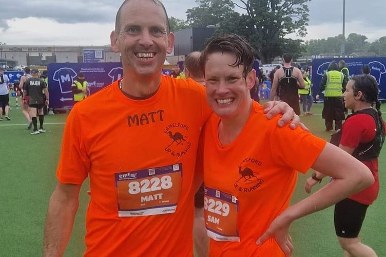 Matt and Sam, after finishing a very wet Edinburgh Marathon