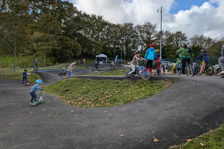 Children using the Pendowr pump track ahead of the opening ceremony. (Picture: Aaron Greenaway)