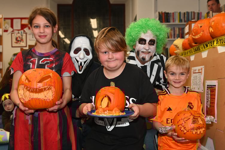 Camelford Town Council held their Pumpkin Parade at the Towns Library on Wednesday 30th October pictured are the prize winning carved pumpkins 1st place Mia, 2nd place Alex, 3rd place Harry along with Neil Pearce (Camelford Town Council Grounds Manager) and Rob Rotchell (Camelford Town Mayor)