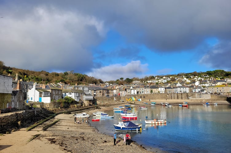 In between the showers over Mousehole Harbour