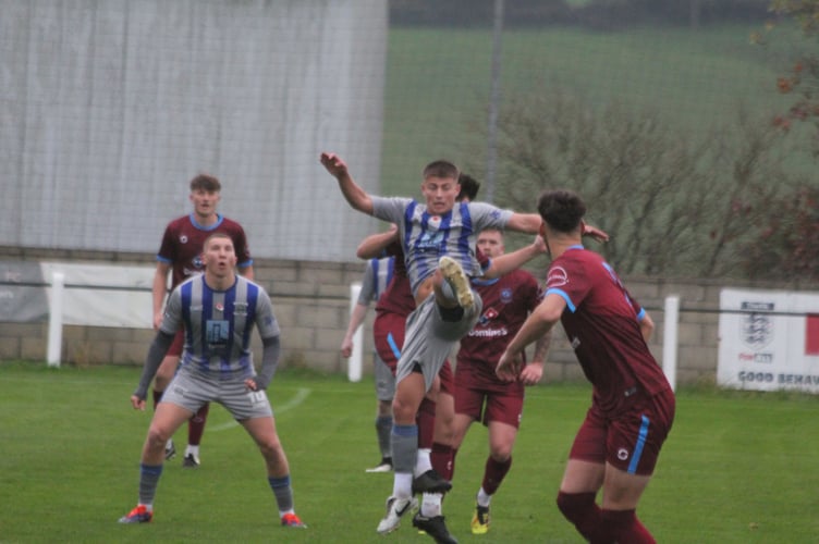 Midfield action on a grey afternoon at Pennygillam. Picture: Paul Hamlyn