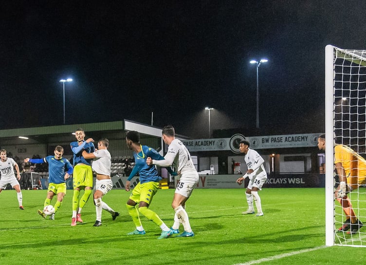 Andrew 'Rocky' Neal, pictured striking at goal, was superbly denied by Boreham Wood man of the match: Nathan Ashmore. Picture: Colin Bradbury