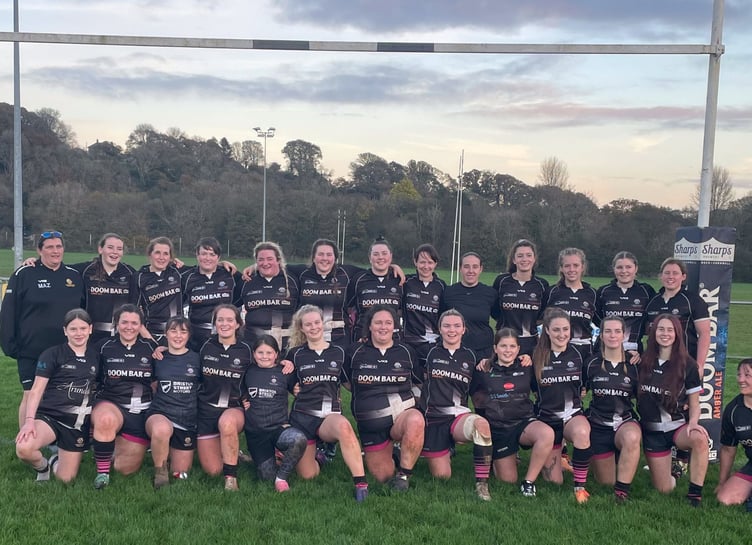 Launceston Ladies, who are pictured with a couple of the under 12s team who enjoyed their afternoon with the senior squad before and after their 29-5 victory over Hornets at Polson Bridge on Sunday. Picture: Launceston Rugby Club