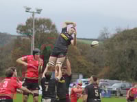 Rowley's late brace keeps CABs in touch with the top two