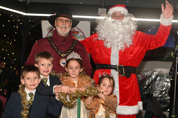 A moment of celebration as Camelford Town Mayor Rob Rotchell along with Santa and the Camelford Royalty Group Faith, Polly, Pirian and Jakka gets the towns lights switched on. (Picture: Adrian Jasper)