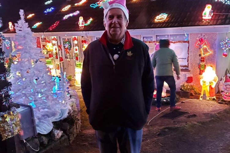 Martin Langdon outside of his festively decorated bungalow. (Picture: Brain Tumour Research)