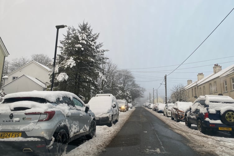 Princetown under snow. The roads have been cleared by snow ploughs, but pavements remain covered
