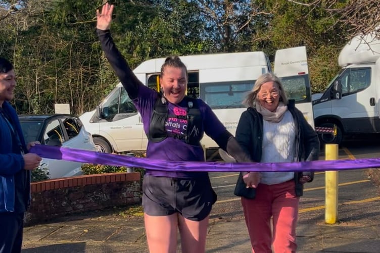 Hollie Prowse (left) and her mother crossing the finish line upon completing the challenge (Picture: Hollie Prowse)